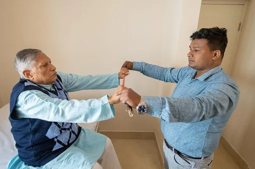 Senior receiving medical checkup, showing advanced healthcare support beyond a traditional old age home - retirement communities